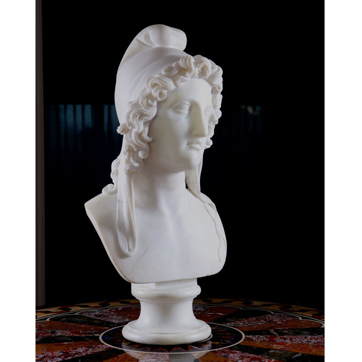 19th Century Bust of Paris carved from Carrara marble depicting Paris wearing a Phrygian cap on a pedestal.