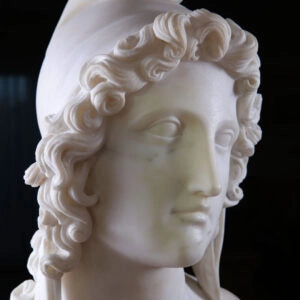 19th Century Bust of Paris carved from Carrara marble featuring Paris with a Phrygian cap, signed N Cocchi.