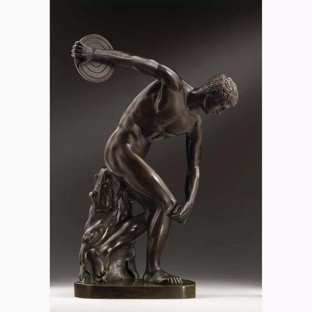 Discobolus After Myron Bronze After the Antique depicts a dynamic ancient Greek discus thrower sculpture.