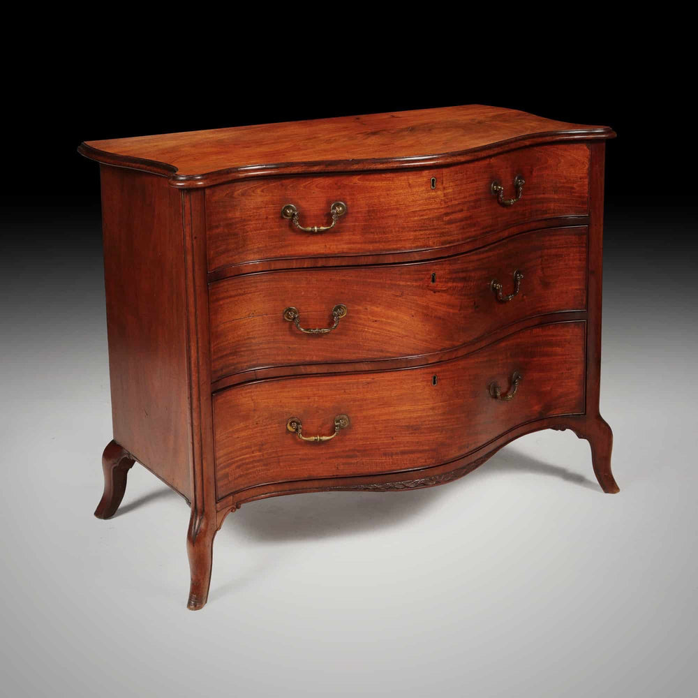 George III serpentine chest of drawers by Henry Hill of Marlborough in mahogany with brass handles Collection CK20