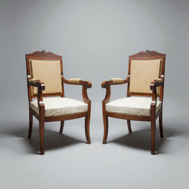 Pair of Baltic Biedermeier armchairs with wooden frames and beige upholstery from Collection CK40 against a plain background