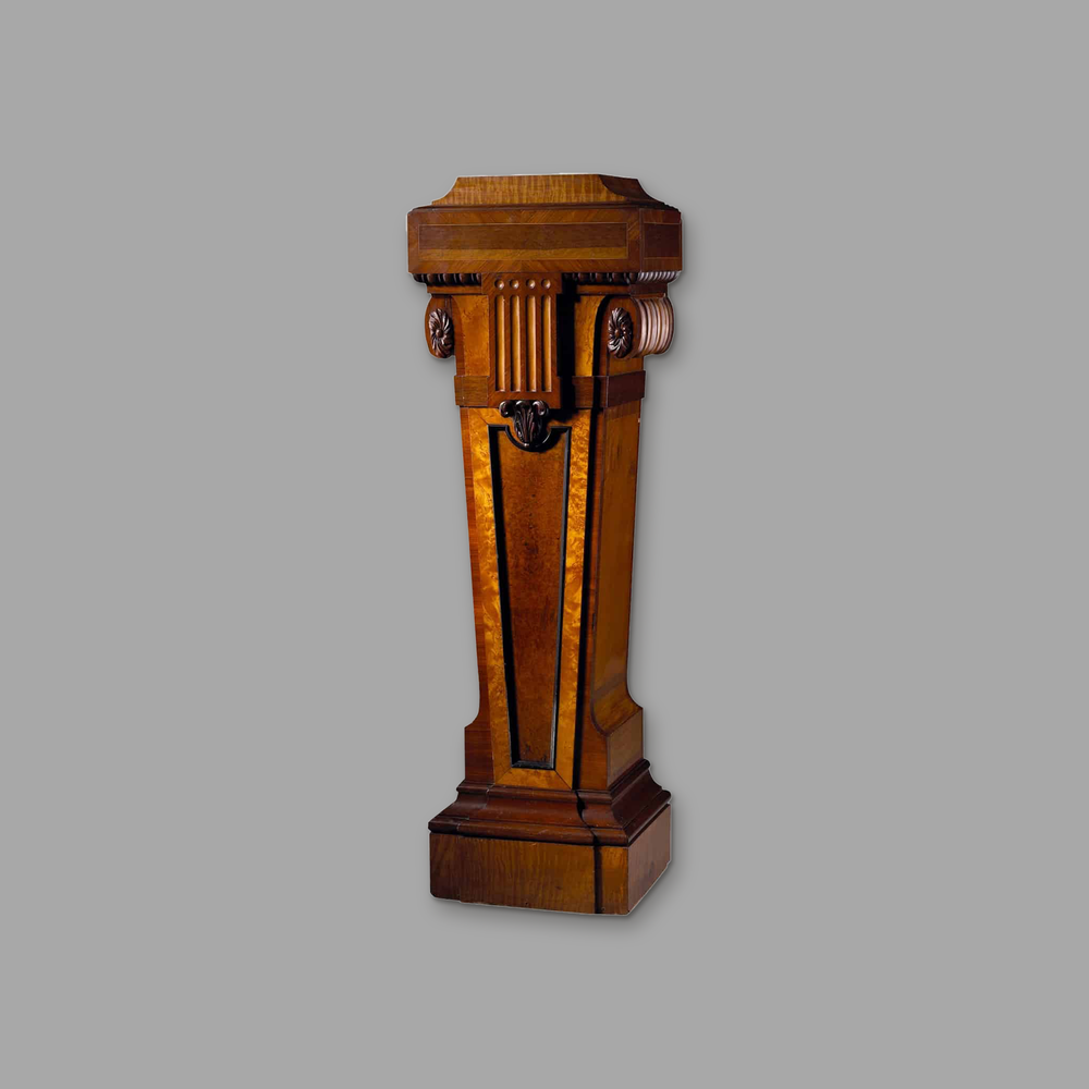 Burr Amboyna and Satinwood Pedestal | Wright & Mansfield, on a plain mid-grey background.