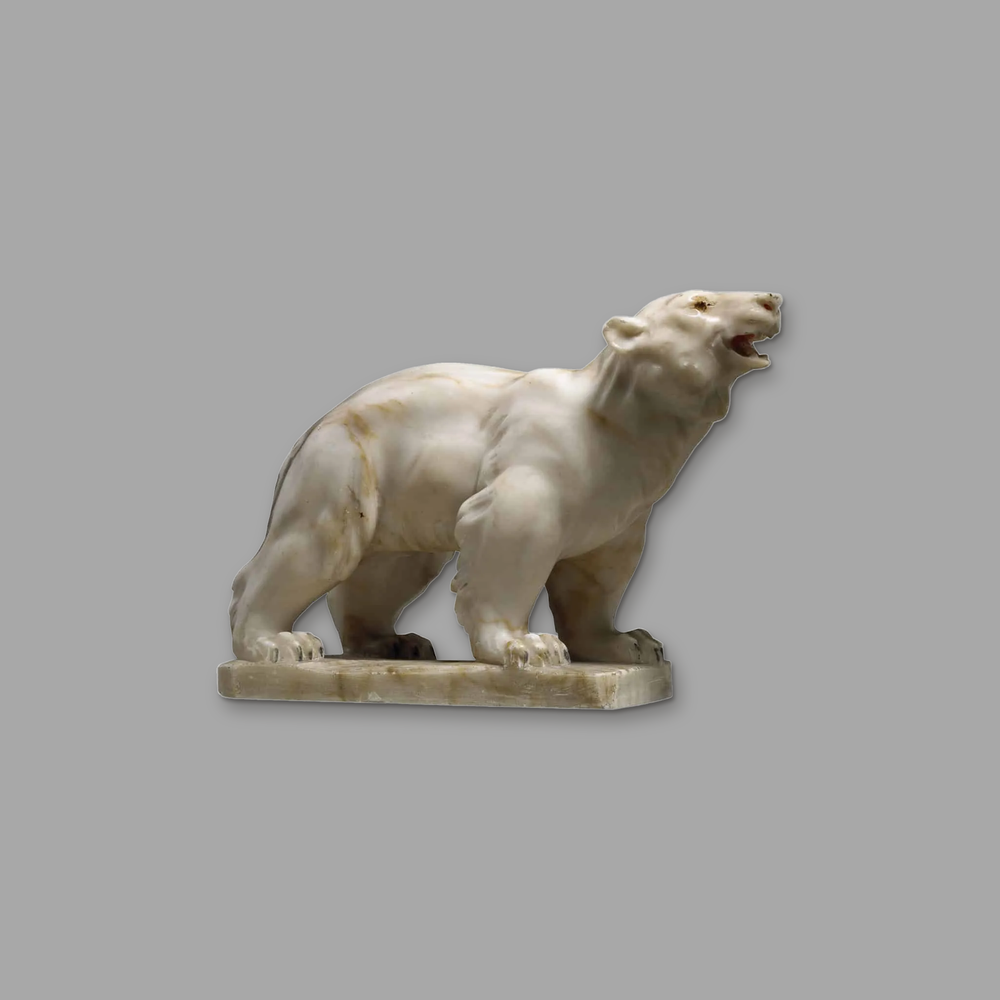 Early 20th Century Alabaster Polar Bear, on a plain mid-grey background.