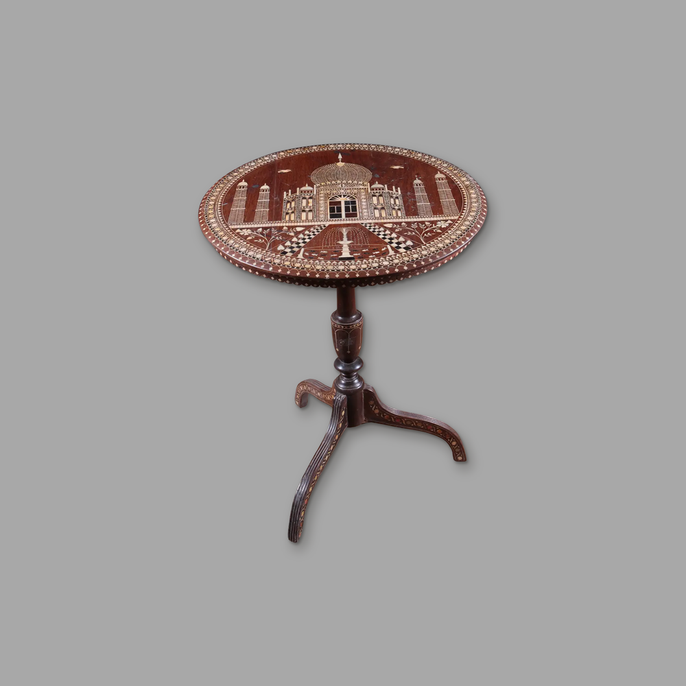 Taj Mahal Inlaid Tilt Top Table, on a plain mid-grey background.