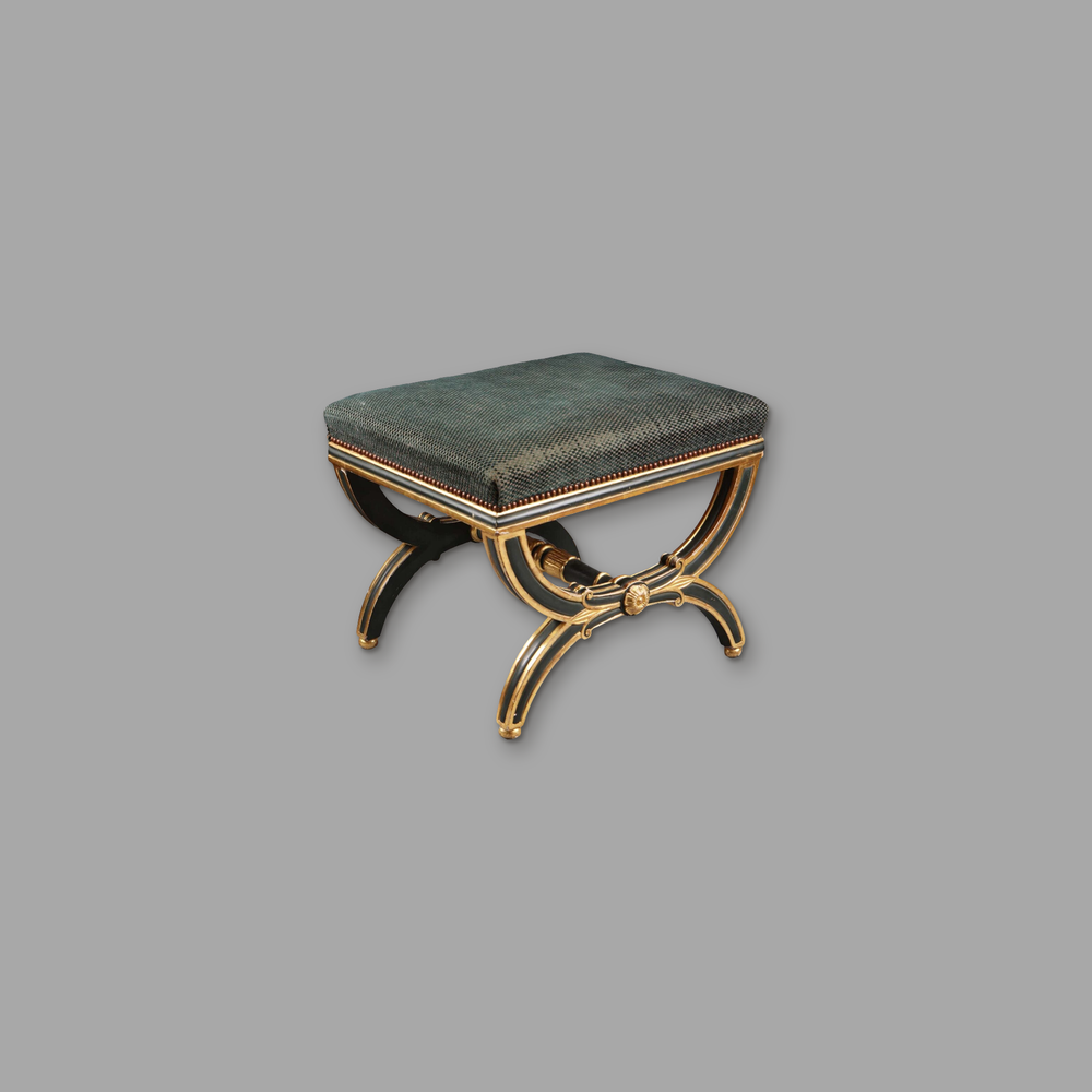 Regency X Frame Parcel Gilt Stool, on a plain mid-grey background.