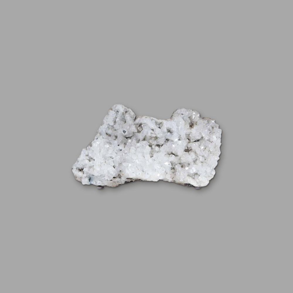 Large Raw Apophyllite Crystal Cluster Specimen Geode, on a plain mid-grey background.
