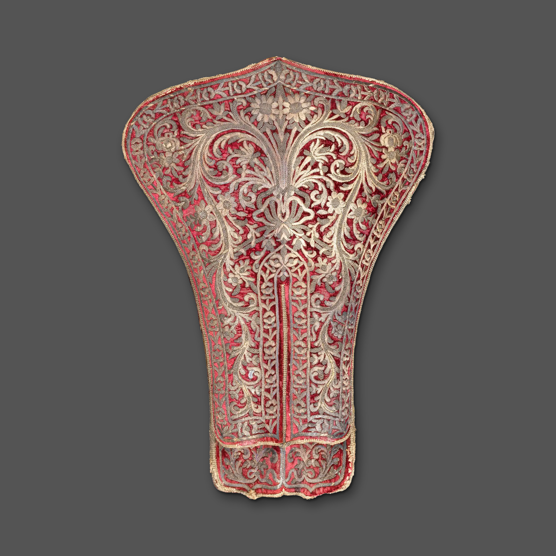 An Ottoman silver thread embroidered double Holster, on a plain dark grey background.