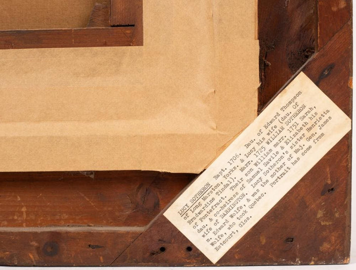 Back of framed Charles Phillips portrait of Lucy Sotheron with label from Nwtiques detailing provenance and history.