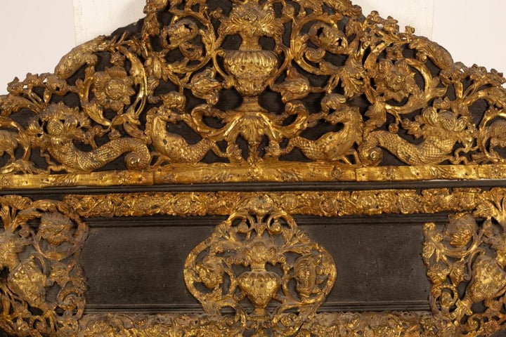 Flemish Wall Mirror with embossed brass decoration, central vase, hippocampi, and cornucopia, Holland circa 1850.