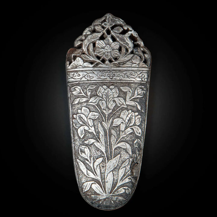 Intricately carved 17th century Mughal cut-steel sword chape with floral design by Nwtiques
