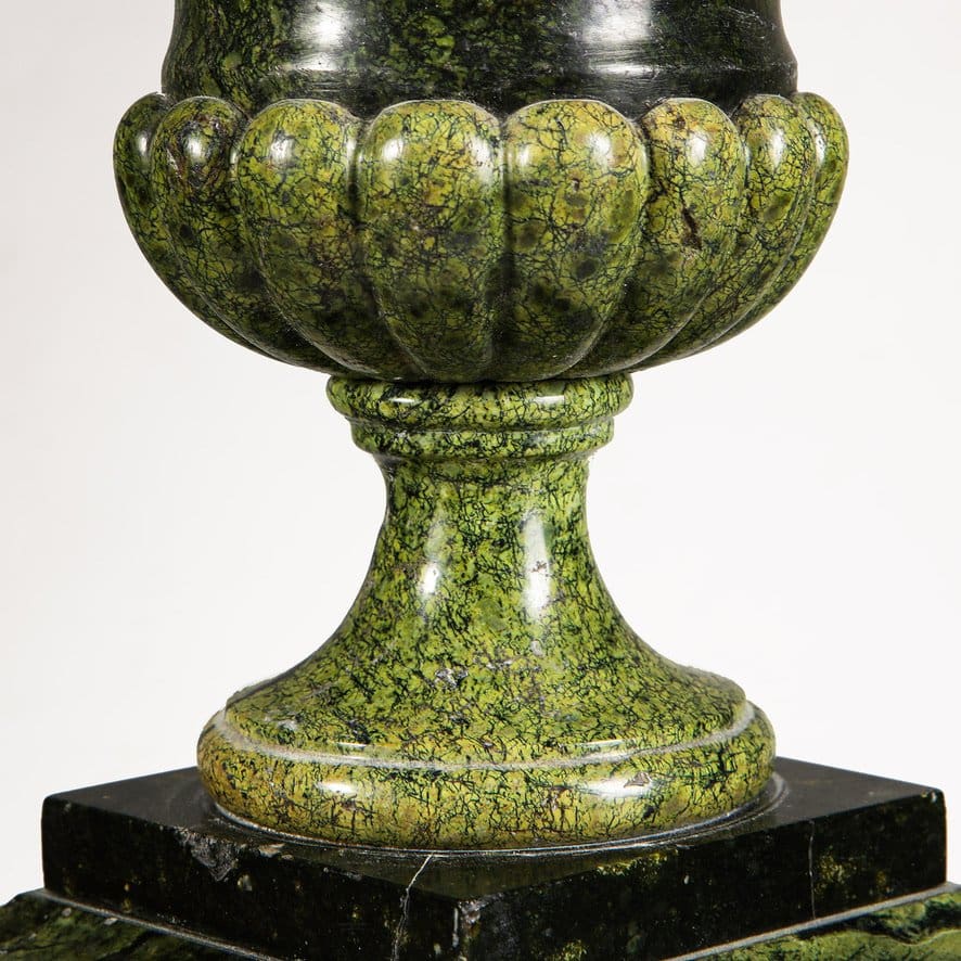 Close-up of a green Alps Jade campagna vase base on stand from Collection TH20 showcasing intricate craftsmanship
