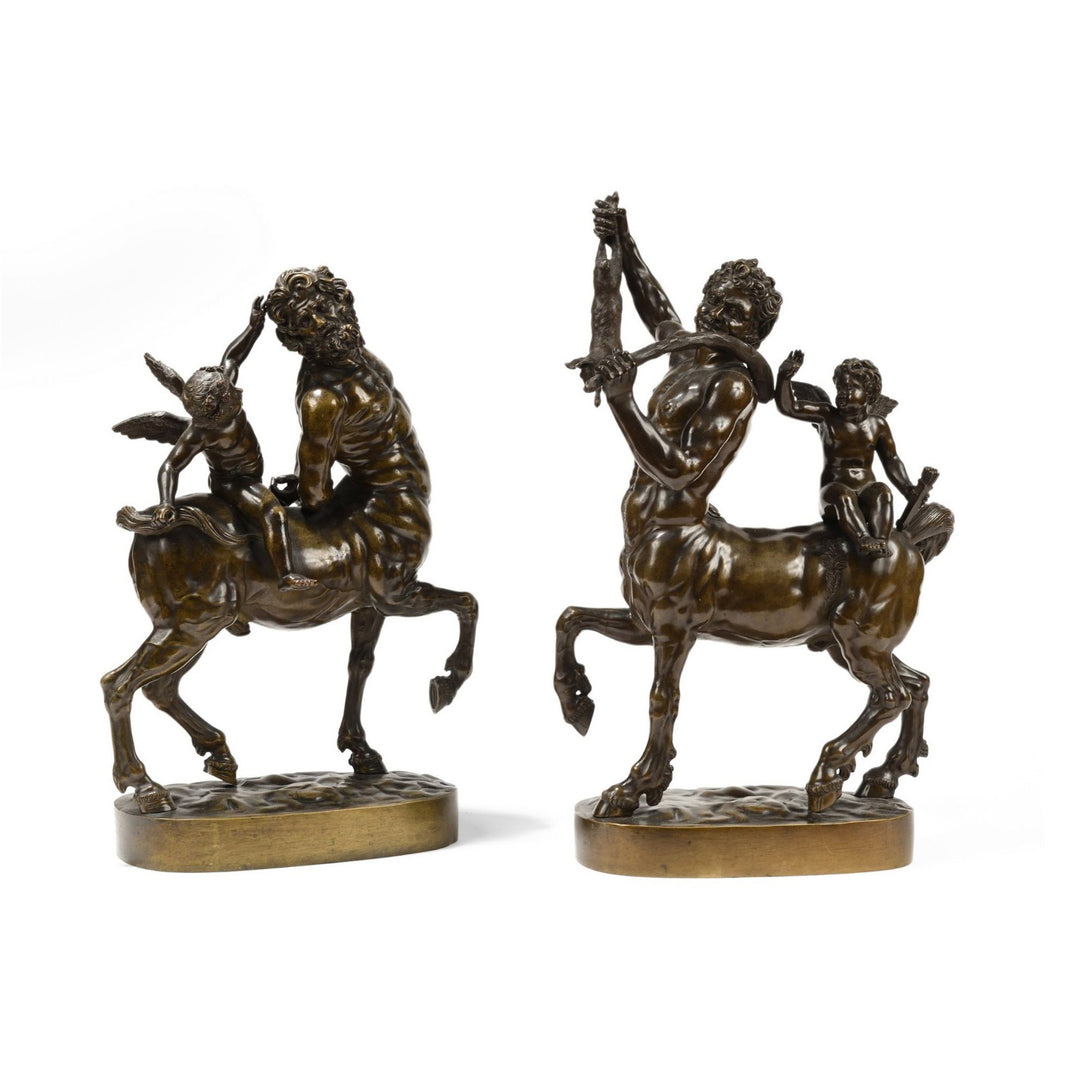Pair of 19th century bronze centaur sculptures on oval bases by Nwtiques, Italy inspired designs