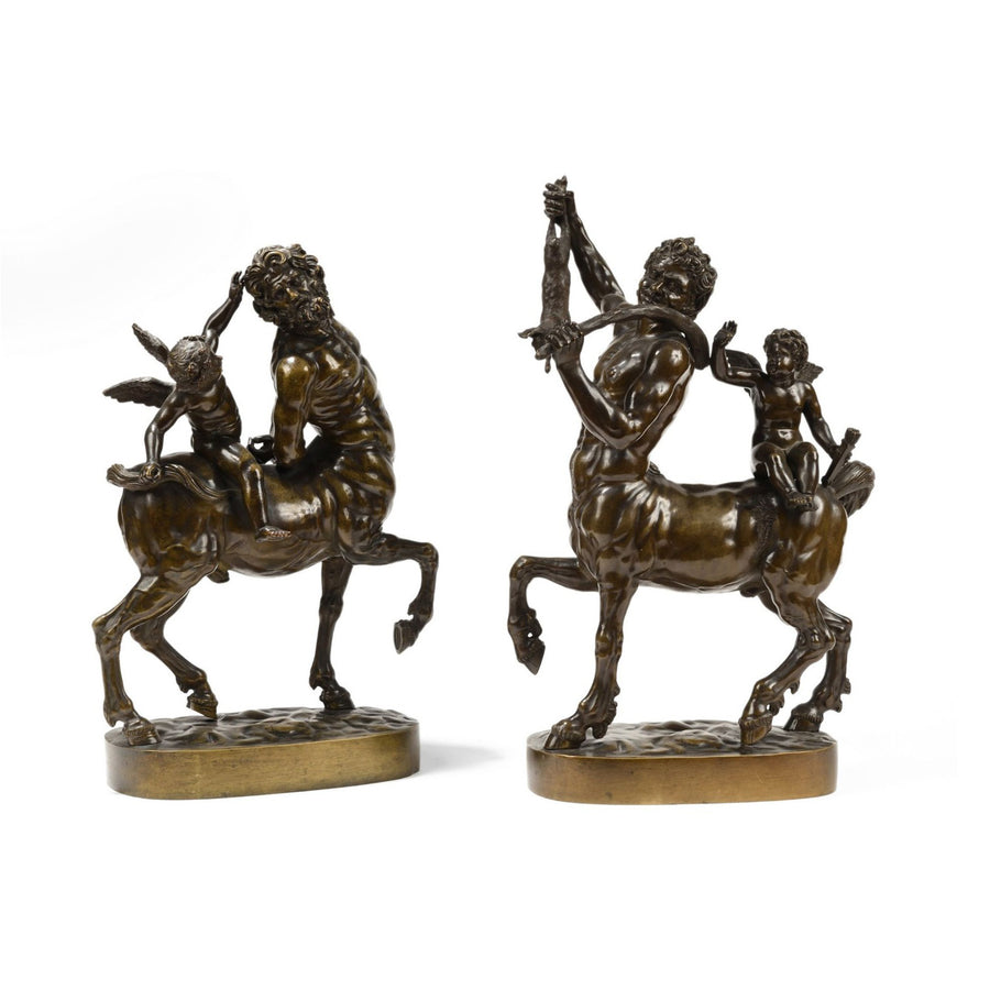 Pair of 19th century bronze centaur sculptures on oval bases by Nwtiques, Italy inspired designs