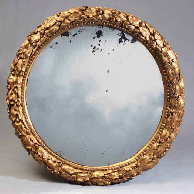 56 inch 19th century gilt convex mirror with oak leaf carvings by The Sold Archive in England circa 1820