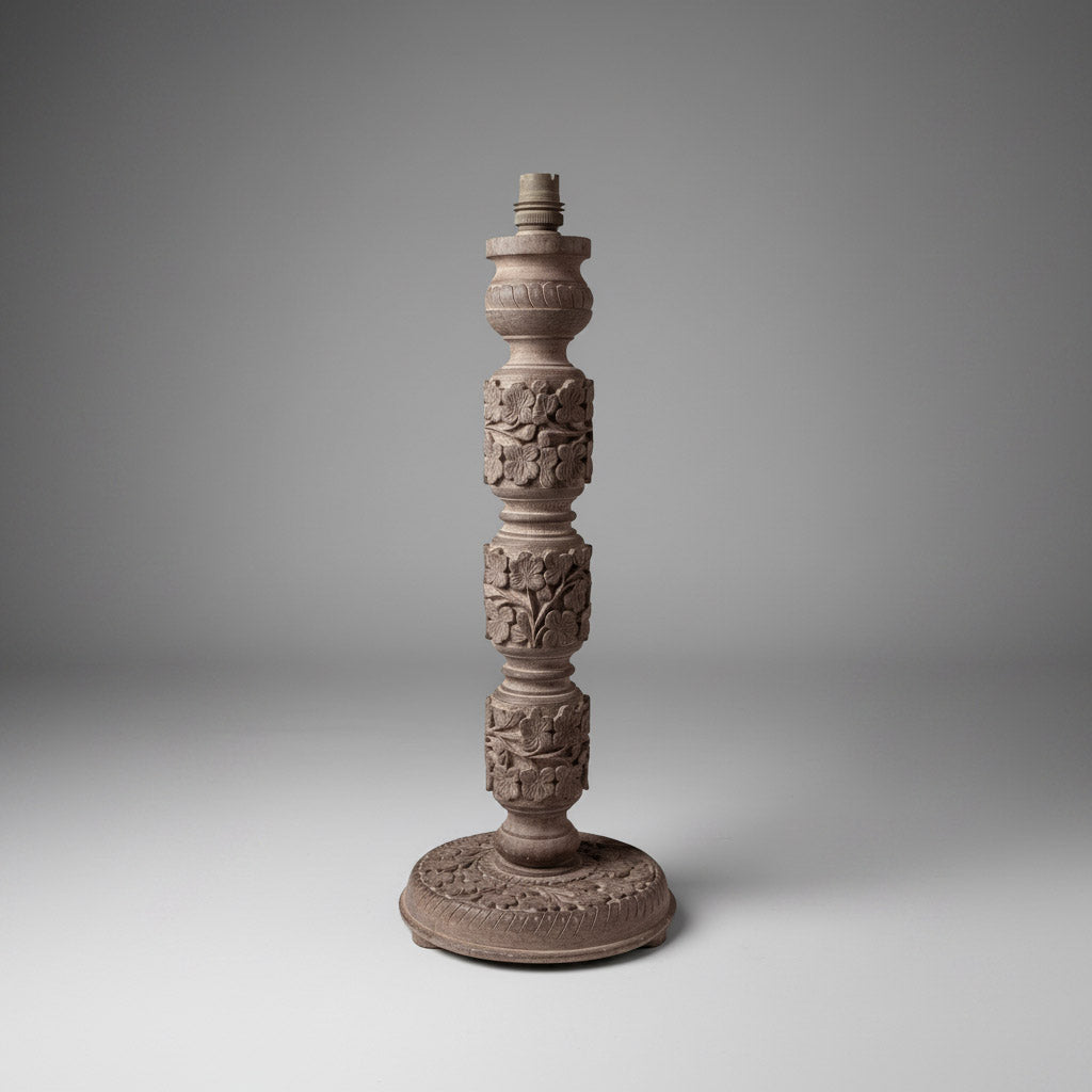A group of four Indian carved wooden lamp bases