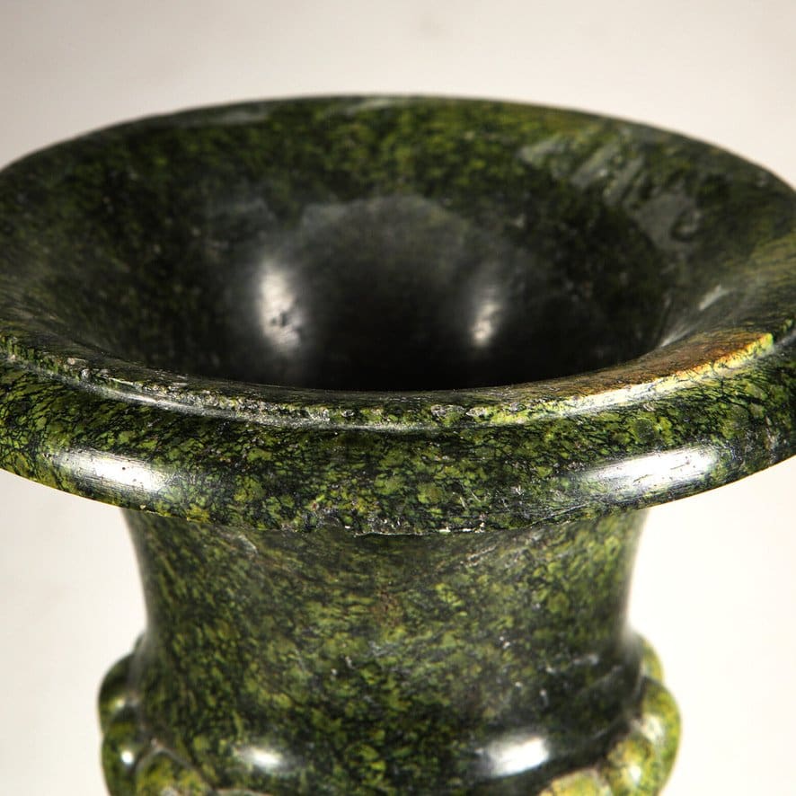 Close-up of a green Alps jade campagna vase rim showing polished stone texture from Collection TH20