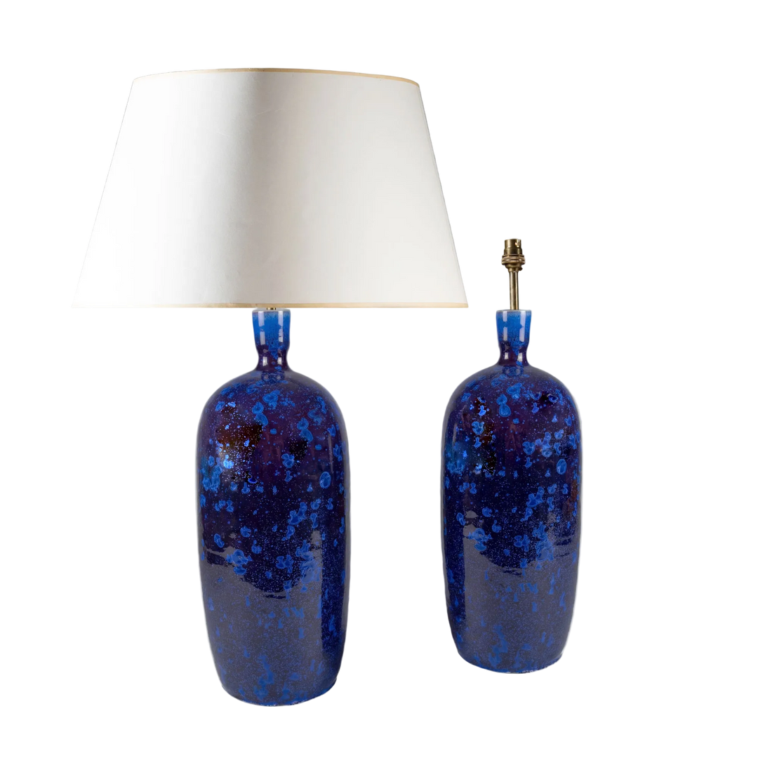 Pair of hand-crafted cobalt blue crystalline glazed ceramic table lamps by Nwtiques with white shades