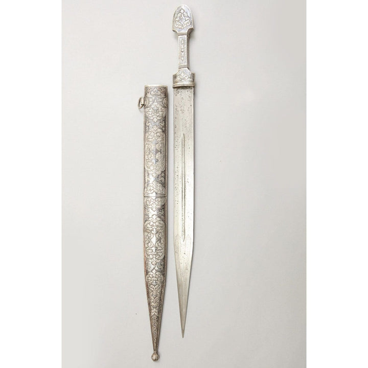 Antique Caucasian Kindjal with intricate silver decoration, 71.5 cm blade, available from Nwtiques.