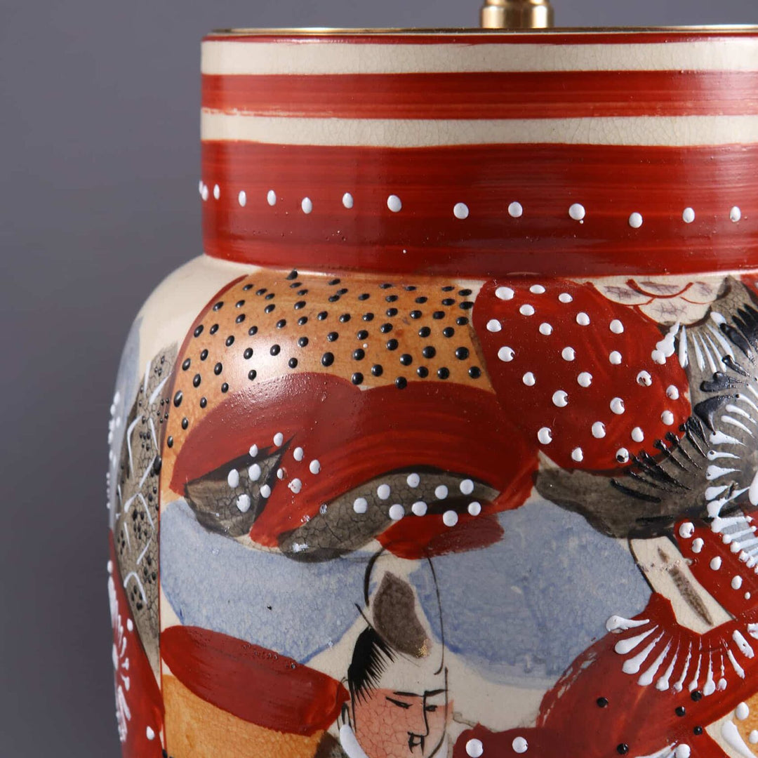 Decorative pair of Japanese 20th Century Vases Mounted as Table Lamps with intricate red and white patterns circa 1930.