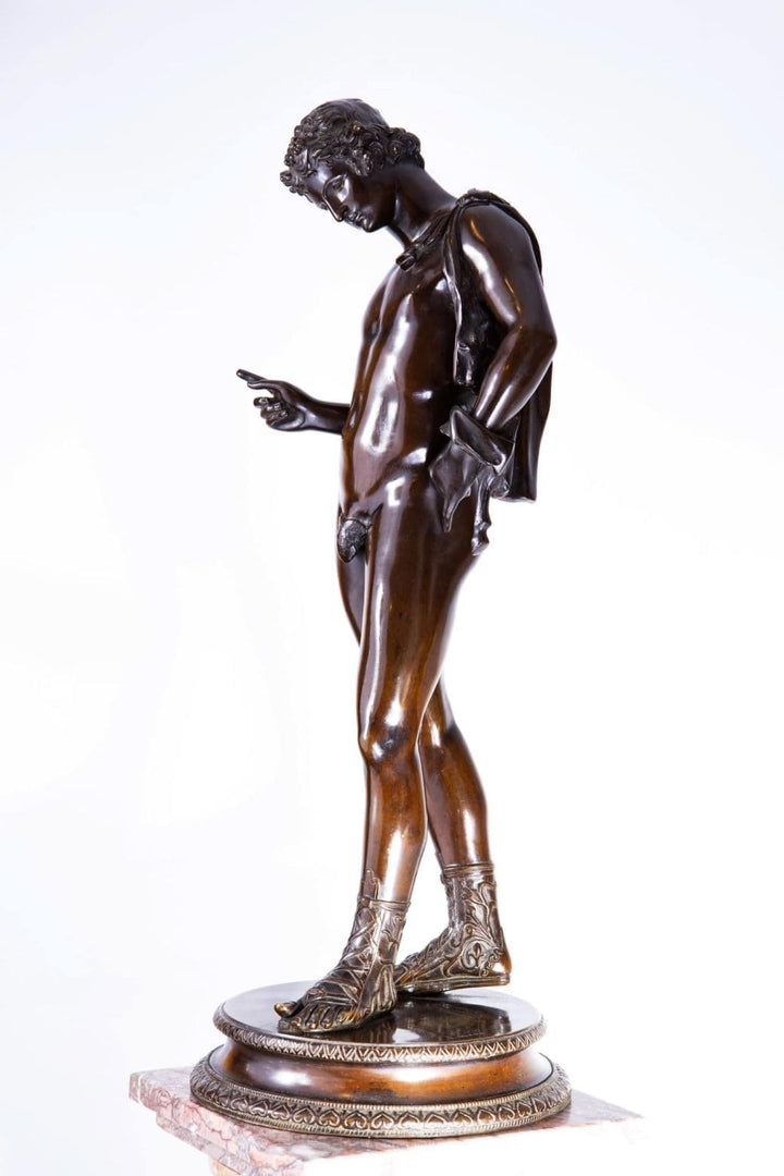 Dionysus – “Narcissus” 19th Century Bronze Statue of a nude male figure with black-brown patina on decorative base.
