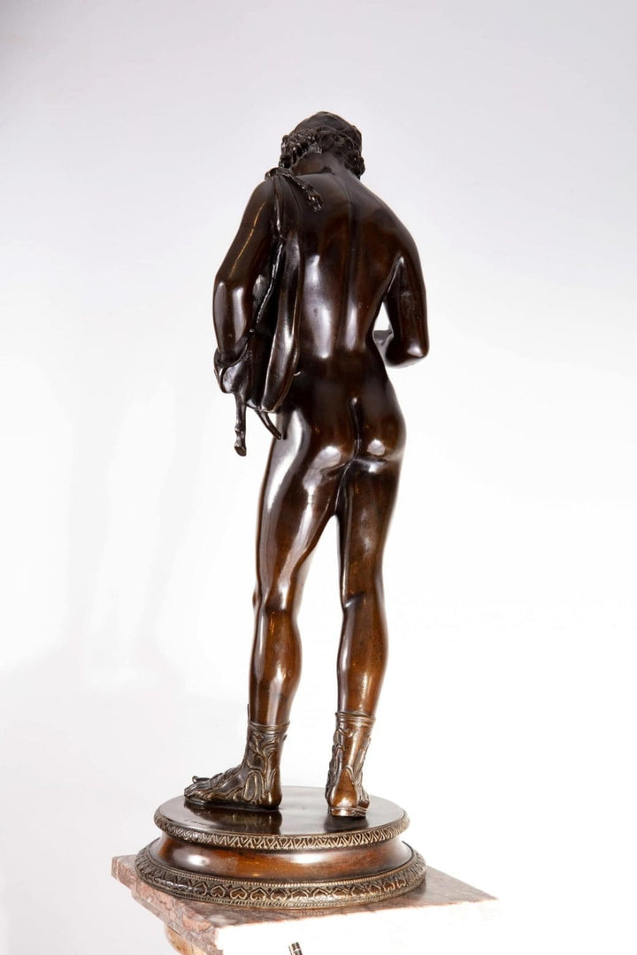 Dionysus – “Narcissus” 19th Century Bronze Statue showing detailed rear view of classical figure with dark patina.