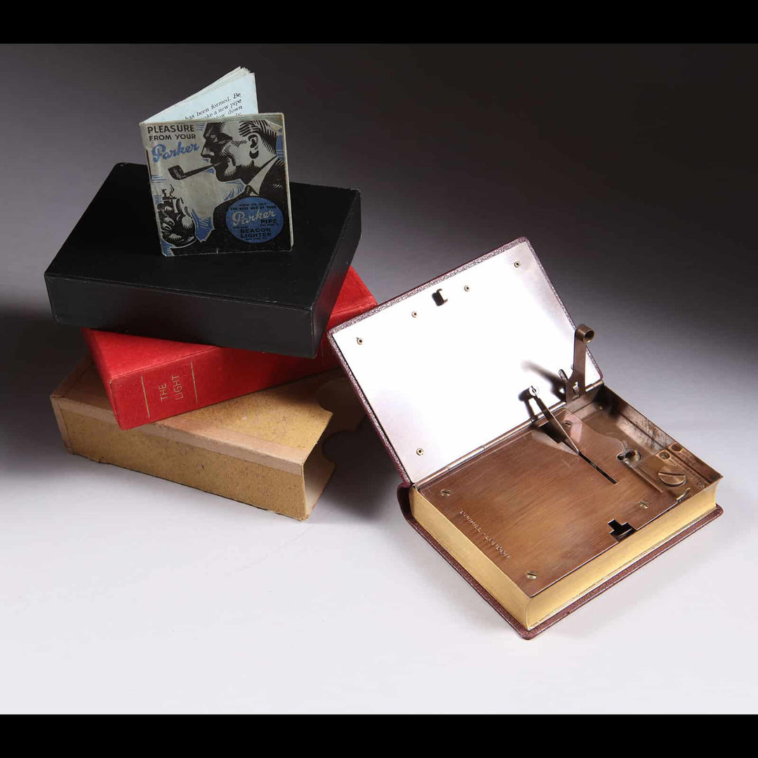 Dunhill ‘The Light’ Novelty Petrol Lighter book-shaped with leather cover and gilt edges by Nicholas Wells Antiques