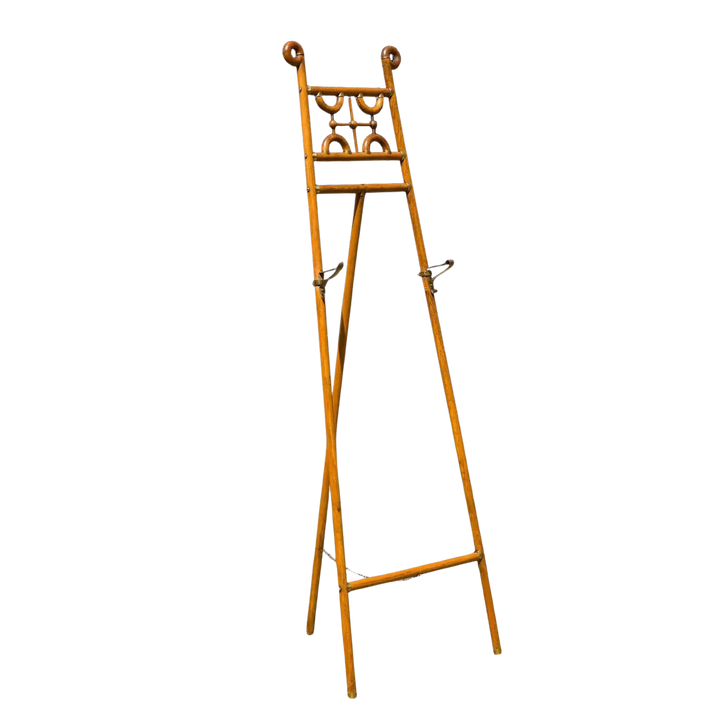 Arts and Crafts oak and brass easel with decorative scrollwork by Collection CK10, circa 1900 English design.