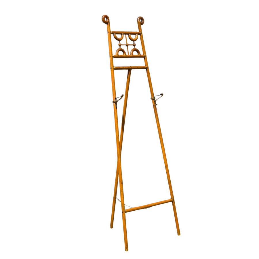 Arts and Crafts oak and brass easel with decorative scrollwork by Collection CK10, circa 1900 English design.