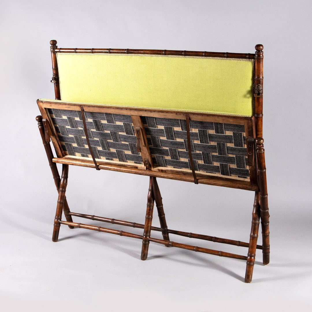 Edwardian folding simulated bamboo campaign settee with green upholstery by Collection TH20, elegant and portable design