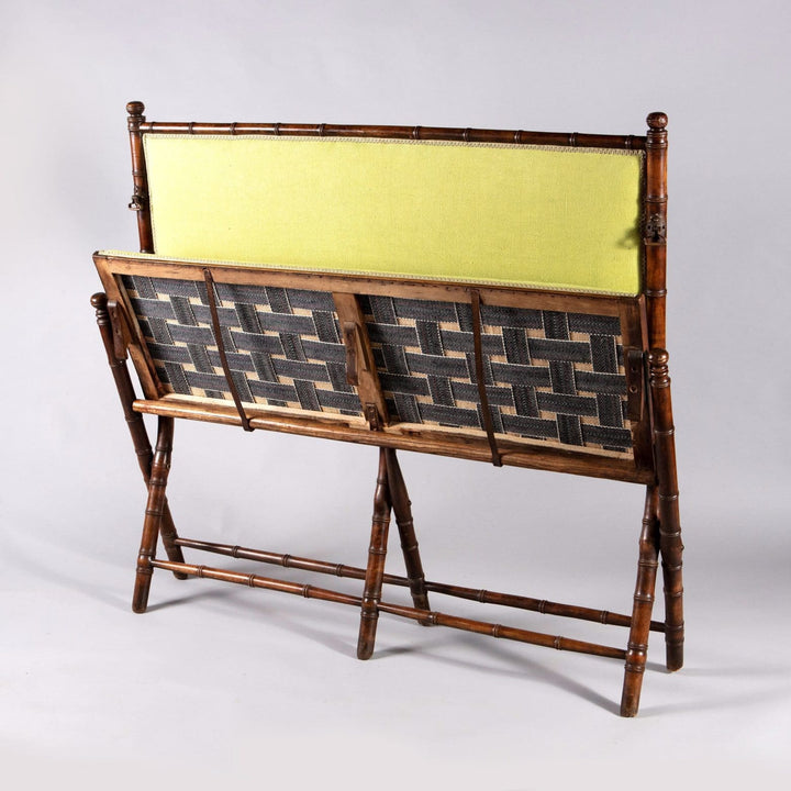 Edwardian folding simulated bamboo campaign settee with green upholstery by Collection TH20, elegant and portable design