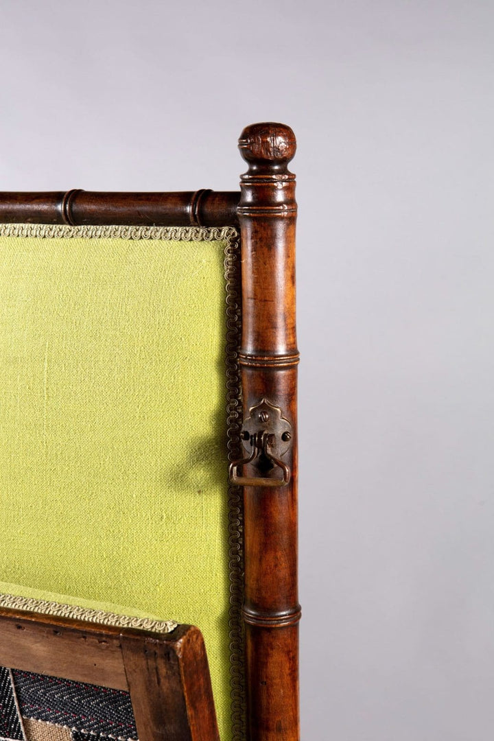 Close-up of Edwardian folding simulated bamboo campaign settee green upholstery from Collection TH20