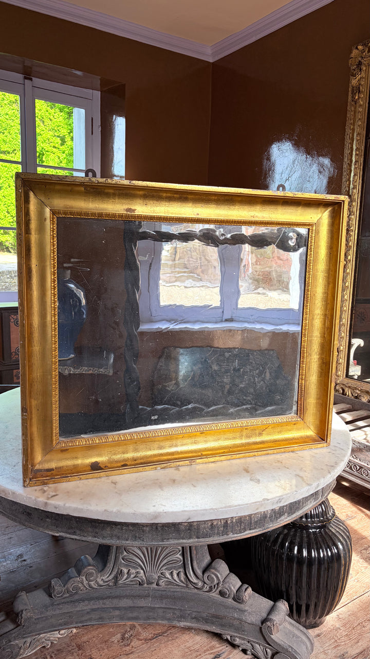 An Italian Water-Gilt Mirror with Original Hand-Blown Glass