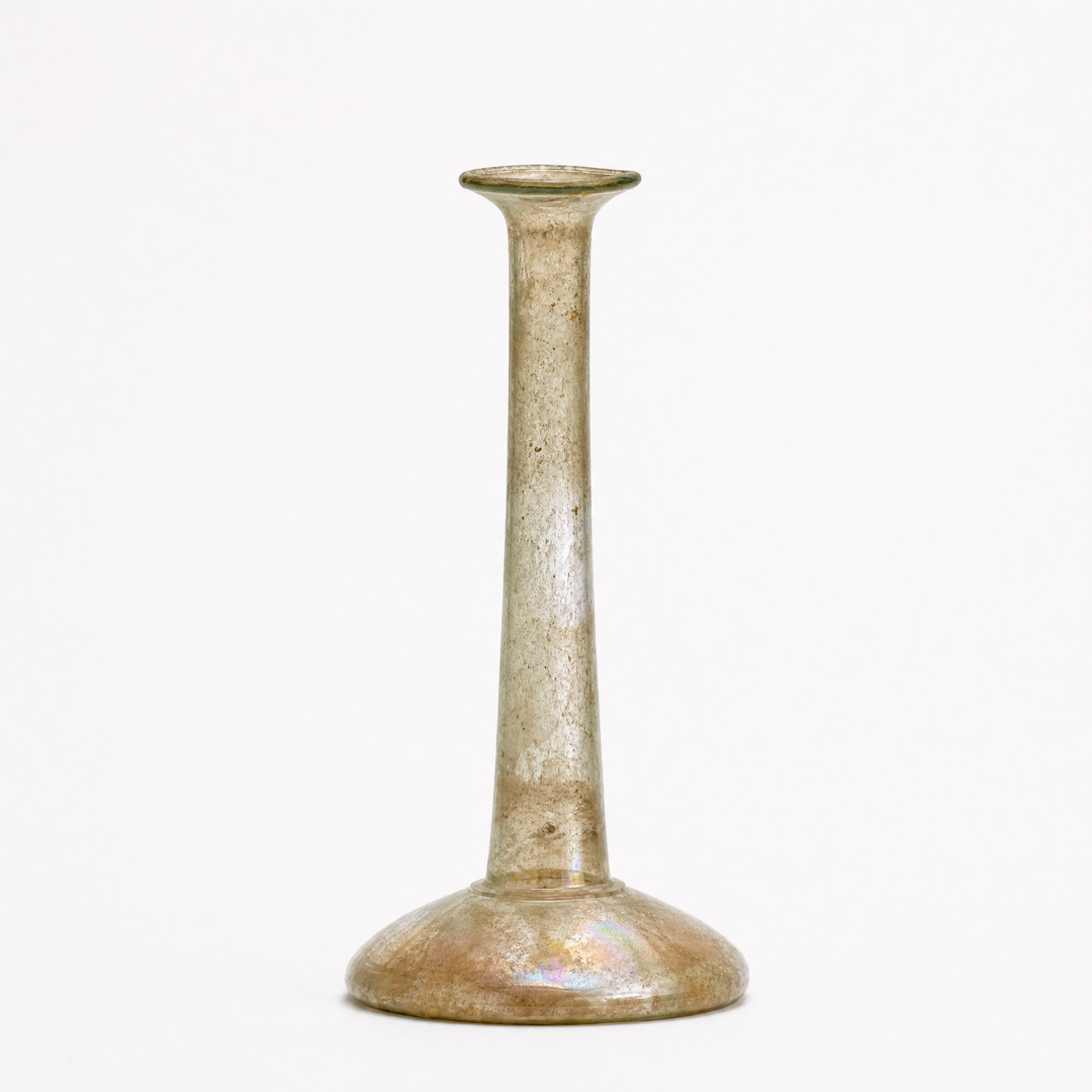 A Large Roman Clear Glass Candlestick Unguentarium