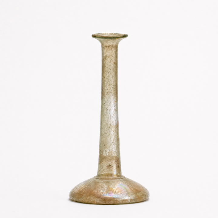 A Large Roman Clear Glass Candlestick Unguentarium