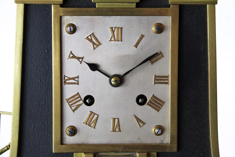 Close-up of Guilmet Industrial Steam Hammer Clock dial with Roman numerals from Nwtiques