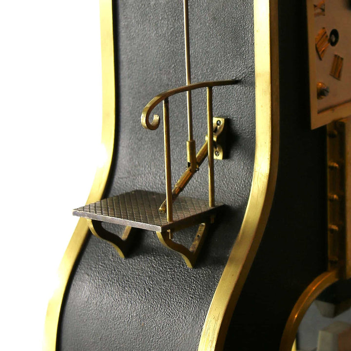 Close-up detail of Guilmet Industrial Steam Hammer Clock with black patinated brass finish by Nwtiques