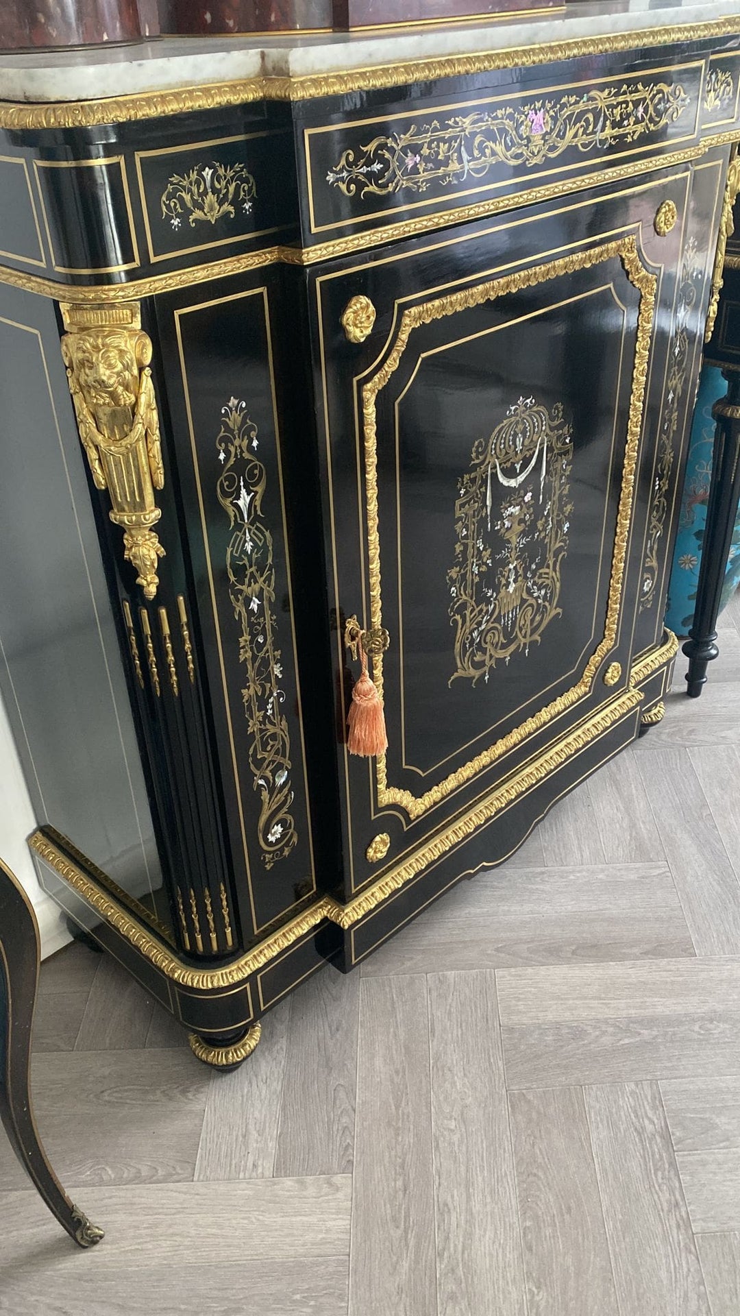 Mother of pearl inlaid ebonised cabinet with gilt bronze mounts and Carrara marble top by Nwtiques