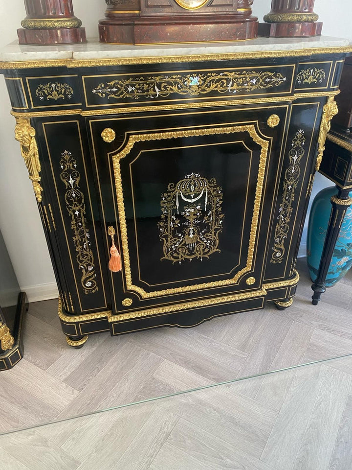Mother of pearl inlaid ebonised cabinet with gilt bronze mounts and Carrara marble top by Nwtiques