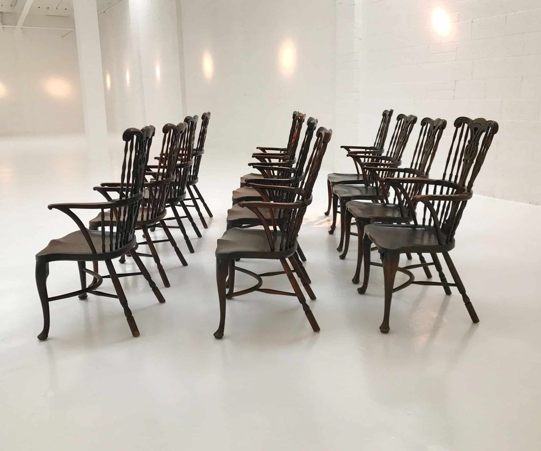 Set of 12 Georgian comb-back Windsor armchairs with elm seats and cabriole legs by Nwtiques