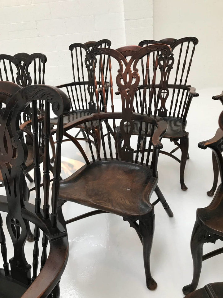 Set of 12 Georgian comb-back Windsor armchairs with elm saddle seats by Nwtiques circa 1770 England