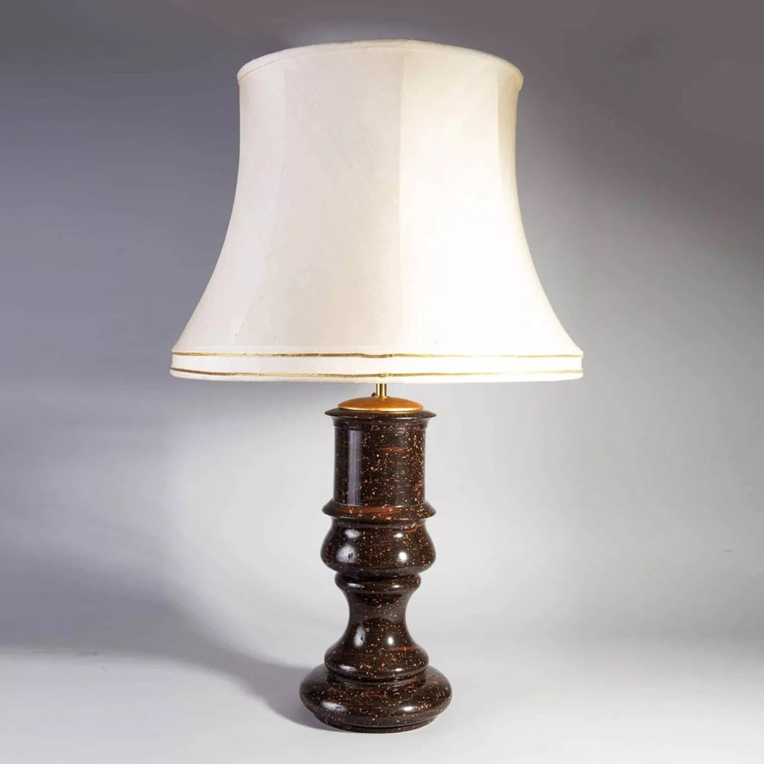 A rare large scale Swedish porphyry vase as a lamp with cylindrical body and white fabric shade.