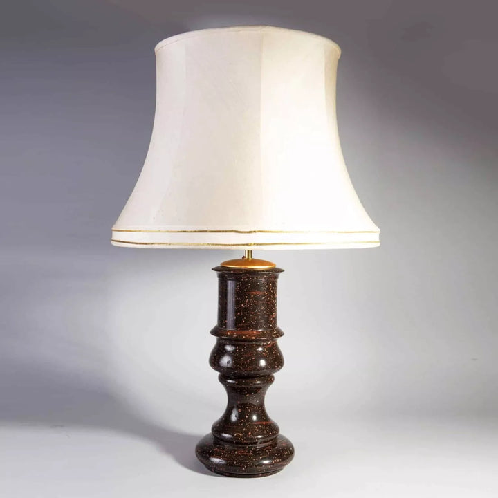 A rare large scale Swedish porphyry vase as a lamp with cylindrical body and white fabric shade.