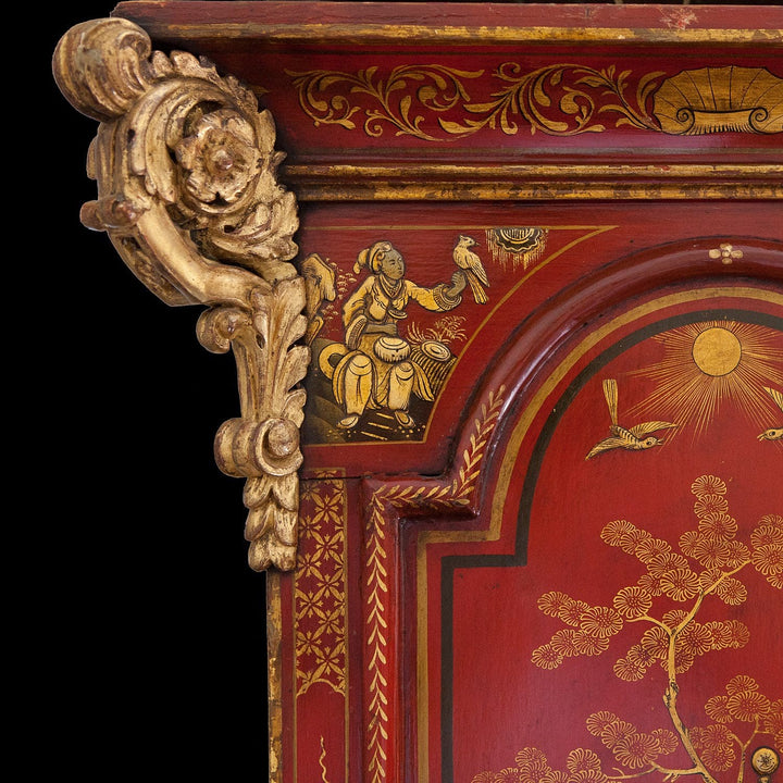 Close-up of red japanned wood with gilt carving and chinoiserie decoration from Collection TH20 Austin of Shoreditch clock