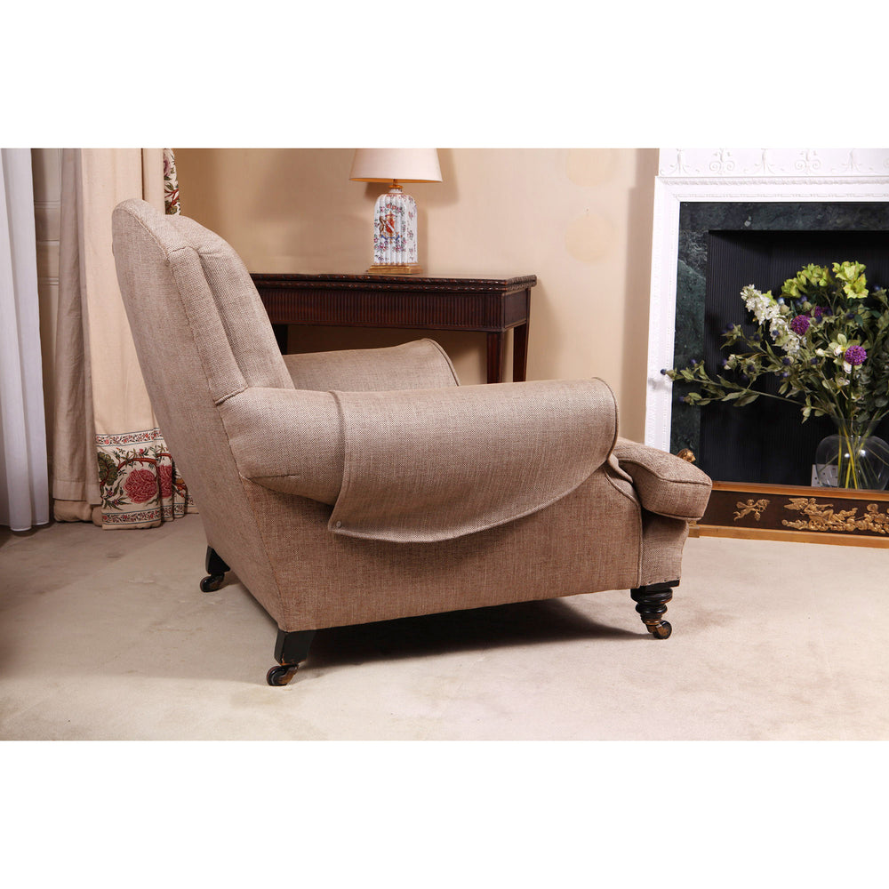 Large Howard style easy chair with mahogany legs and casters in beige fabric by Collection TH30