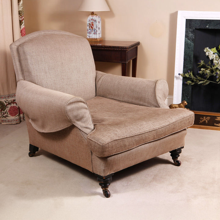 Large Howard style easy chair with carved mahogany legs and casters by Collection TH30 circa 1900 England