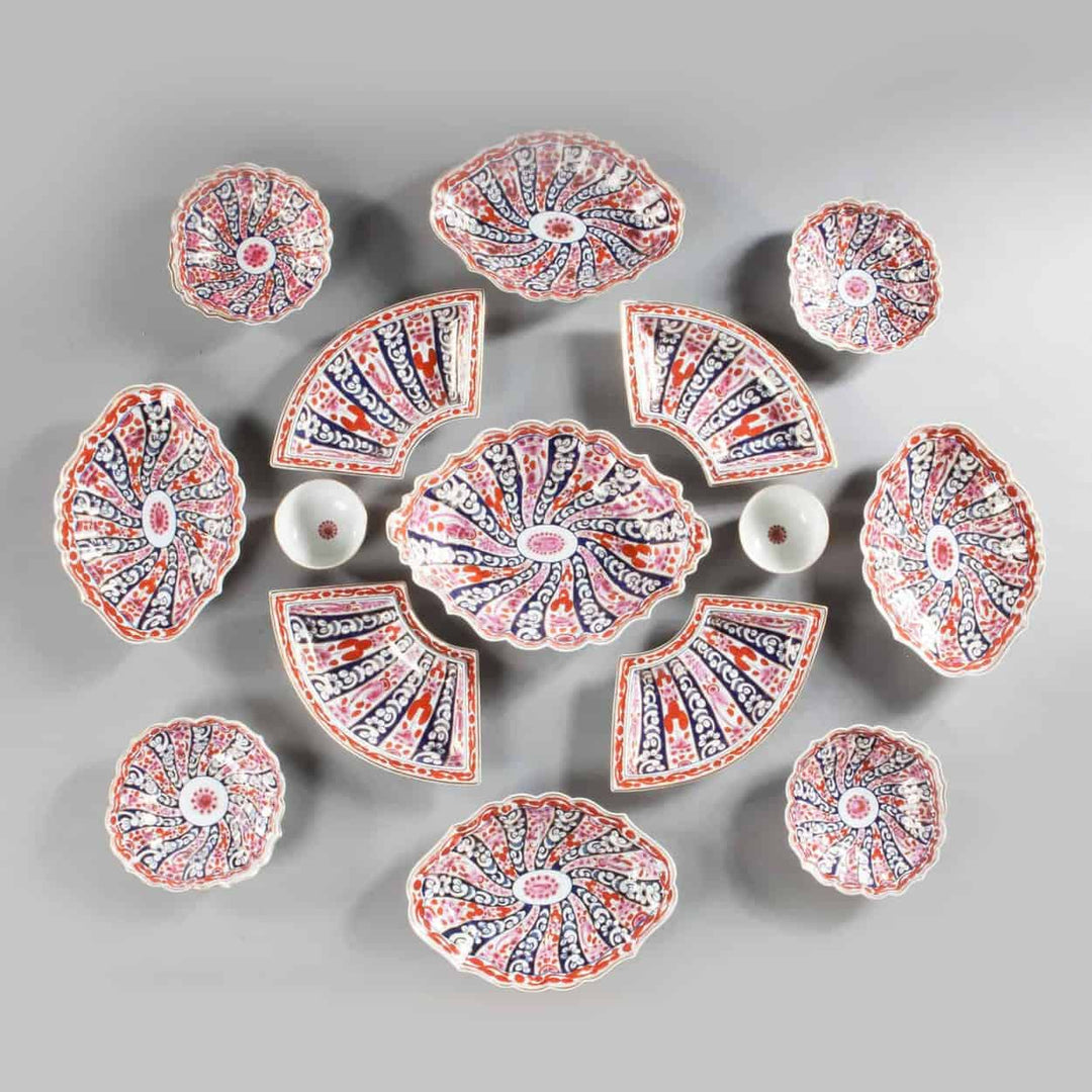 Worcester Queen Charlotte pattern composite service plates and bowls arranged in elegant display by Collection TH10