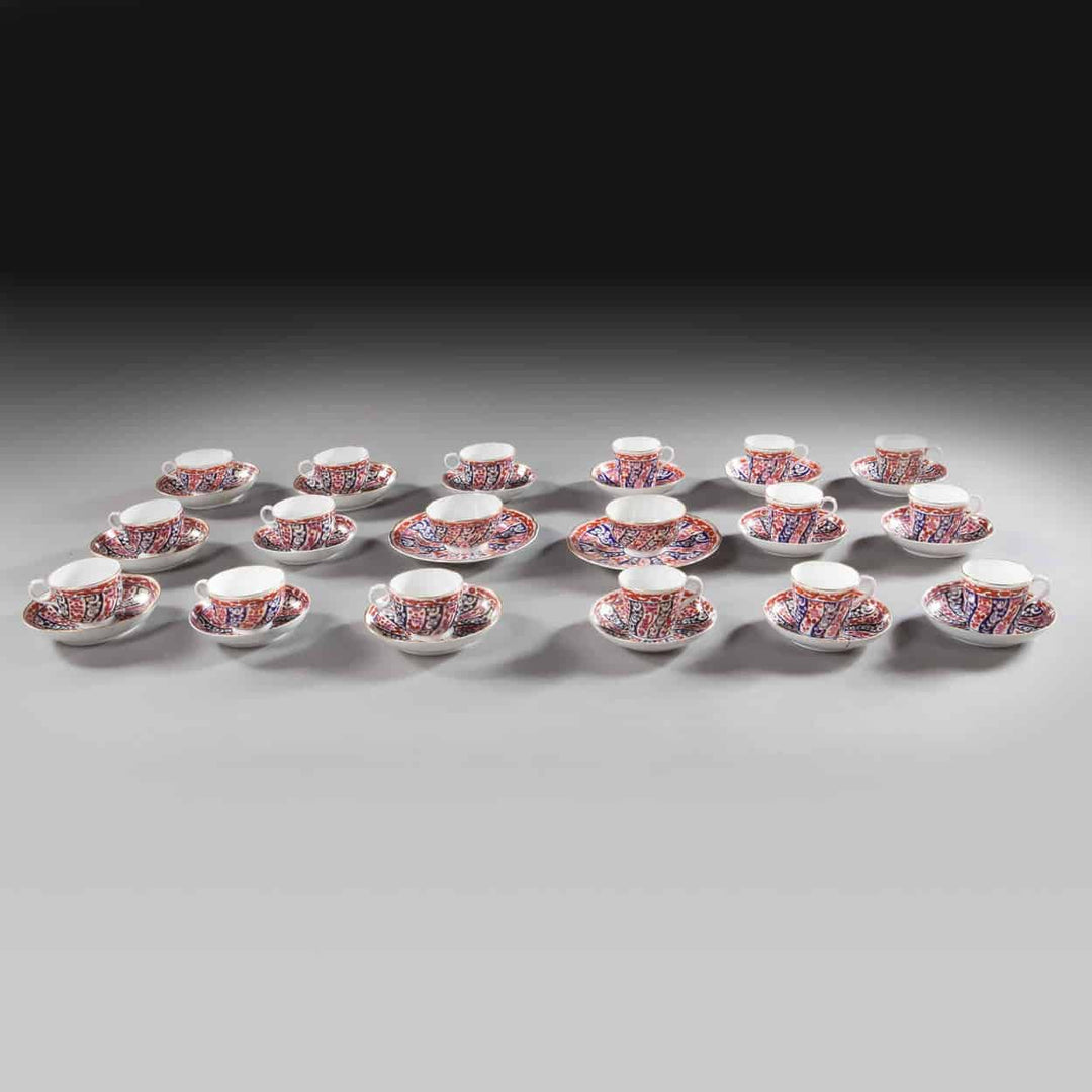 Worcester Queen Charlotte pattern teacups and saucers set of 20 pieces by Collection TH10 displayed on gray surface