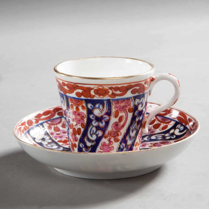 Regency Worcester Queen Charlotte pattern porcelain cup and saucer by Collection TH10 with intricate red and blue details