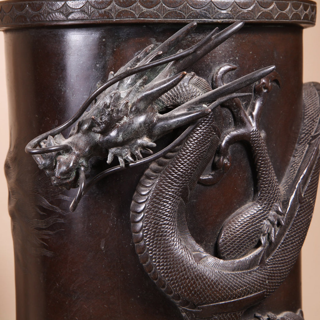 Close-up of a Japanese Meiji bronze dragon stick stand from Collection TH30 with detailed dragon design circa 1900