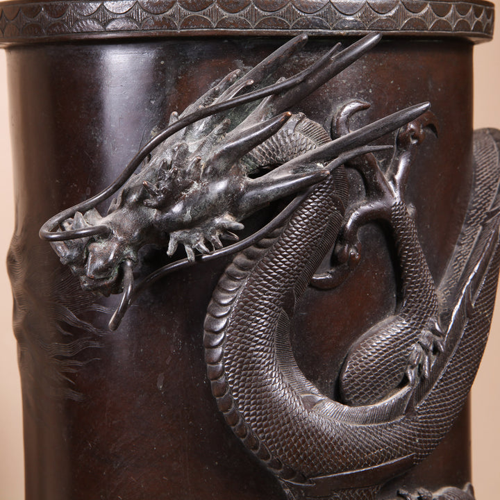 Close-up of a Japanese Meiji bronze dragon stick stand from Collection TH30 with detailed dragon design circa 1900
